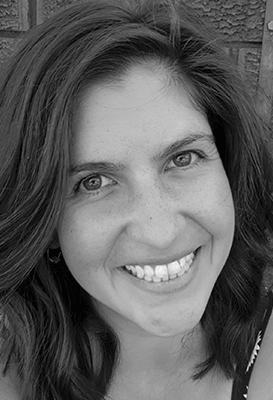 A close-up black and white portrait of Dr Emma Burns